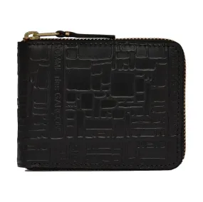 COMME DES GARCONS EMBOSSED LOGOTYPE WALLET